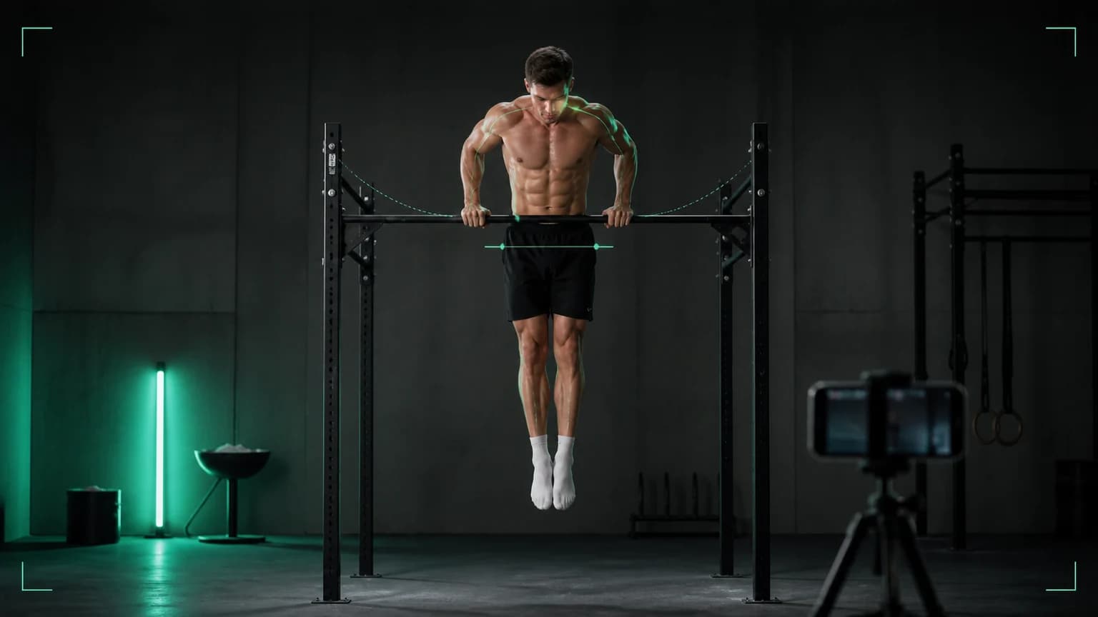 Calisthenics athlete reviewing a filmed skill beside a dark pull-up bar with teal analysis accents